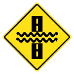 Wc-21 Water Over Road Sign